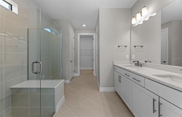 2528 Charter Oak Dr, North Port, FL 34289 - bathroom with recessed lighting, a shower stall, tile patterned floors, and a sink