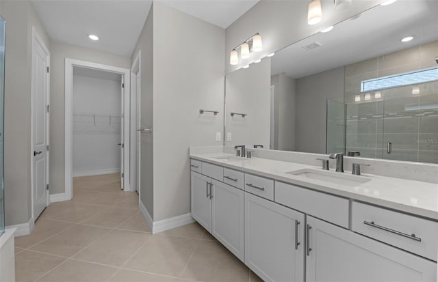 2528 Charter Oak Dr, North Port, FL 34289 - full bathroom featuring tile patterned floors, baseboards, a sink, and a shower stall