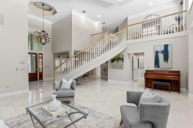 living room with baseboards, marble finish floor, an inviting chandelier, crown molding, and stairway