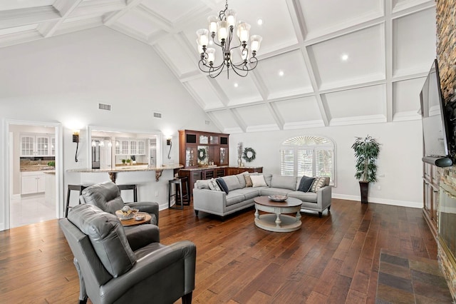 living area featuring visible vents, beam ceiling, high vaulted ceiling, and an inviting chandelier