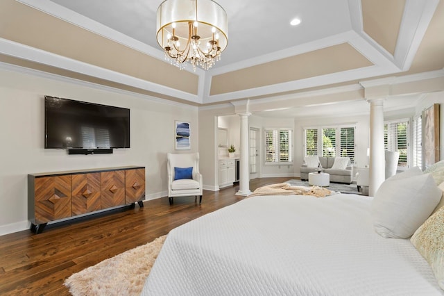 bedroom featuring wood finished floors, ornate columns, baseboards, ornamental molding, and recessed lighting
