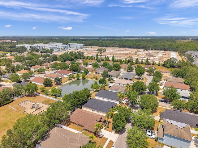 birds eye view of property with a residential view