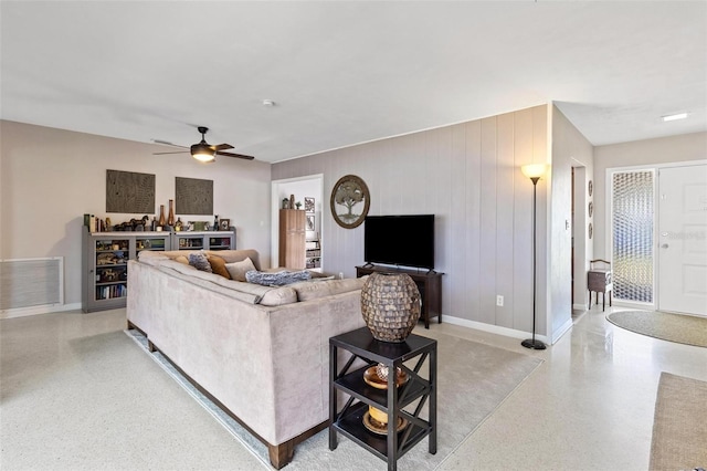 4340 50th Ter S, Saint Petersburg, FL 33711 - living room with light speckled floor, baseboards, a ceiling fan, and visible vents