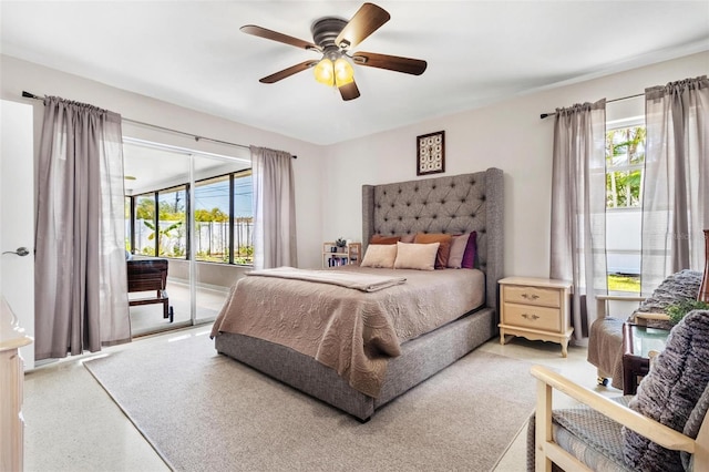 4340 50th Ter S, Saint Petersburg, FL 33711 - bedroom with a ceiling fan, access to exterior, and multiple windows