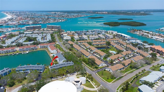 view of property location with a large body of water and nearby urban area