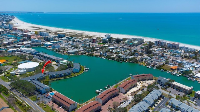 aerial view of property and surrounding area featuring expansive coastline