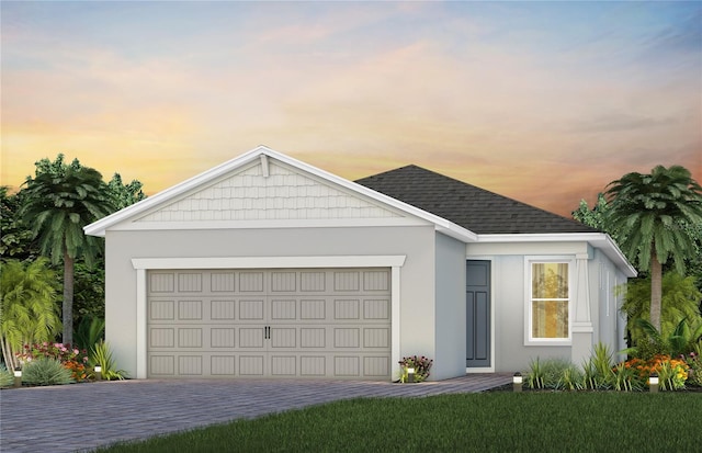 5807 SW 87th Ave, Ocala, FL 34481 - ranch-style house with stucco siding, roof with shingles, driveway, and an attached garage