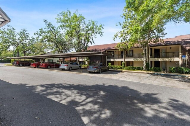 3600 Magnolia Ridge Cir Unit 1221-G, Palm Harbor, FL 34684 - view of partially covered parking lot