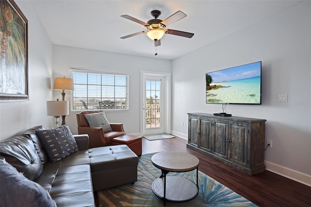 399 2nd St Unit 313, Indian Rocks Beach, FL 33785 - living room with a ceiling fan, dark wood-style flooring, and baseboards