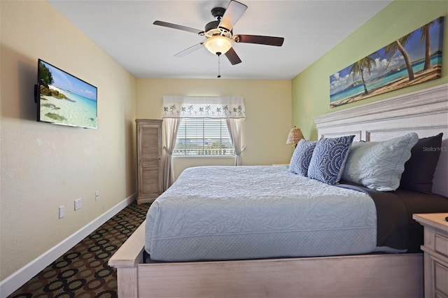 399 2nd St Unit 313, Indian Rocks Beach, FL 33785 - bedroom featuring baseboards and a ceiling fan