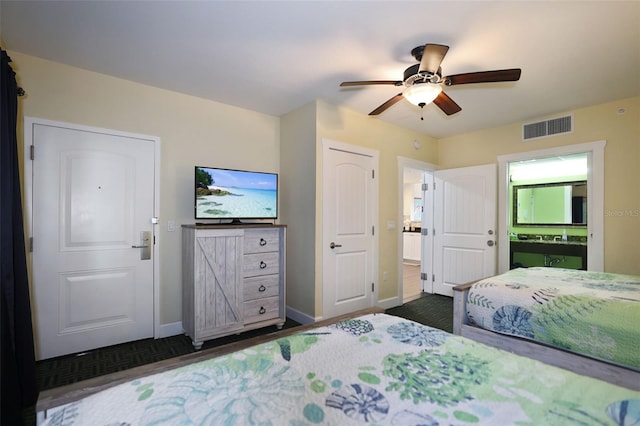 399 2nd St Unit 313, Indian Rocks Beach, FL 33785 - bedroom with visible vents, baseboards, and a ceiling fan