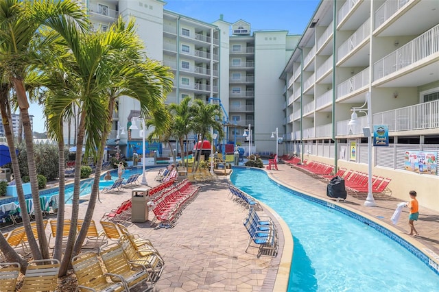 399 2nd St Unit 313, Indian Rocks Beach, FL 33785 - community pool featuring a patio area