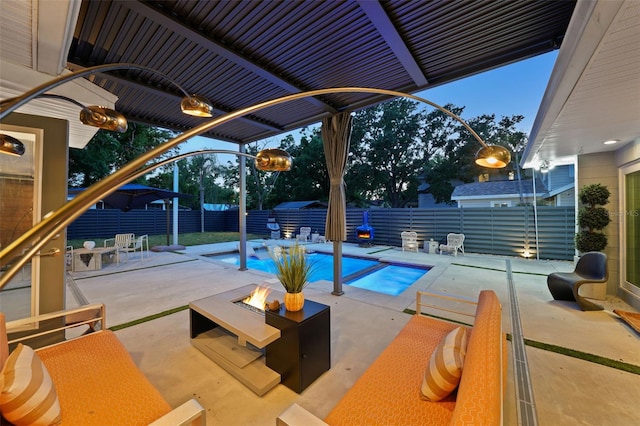 view of pool featuring a fenced in pool, a fire pit, a patio, and a fenced backyard