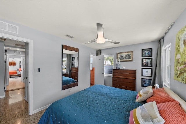 bedroom featuring baseboards, visible vents, and a ceiling fan