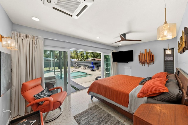 bedroom with recessed lighting and access to exterior
