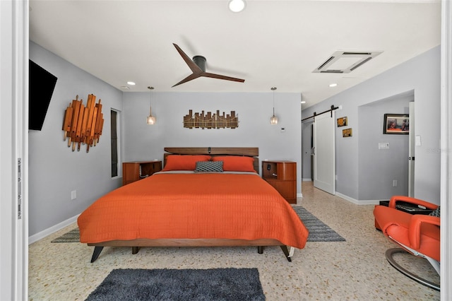 bedroom featuring recessed lighting, ceiling fan, a barn door, and baseboards