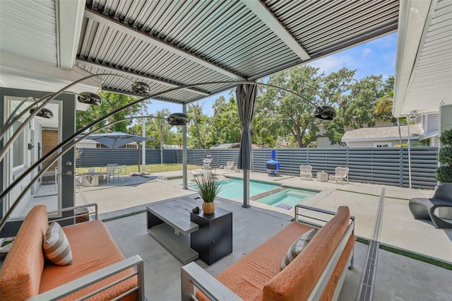 view of patio / terrace with outdoor lounge area, a fenced in pool, and a fenced backyard