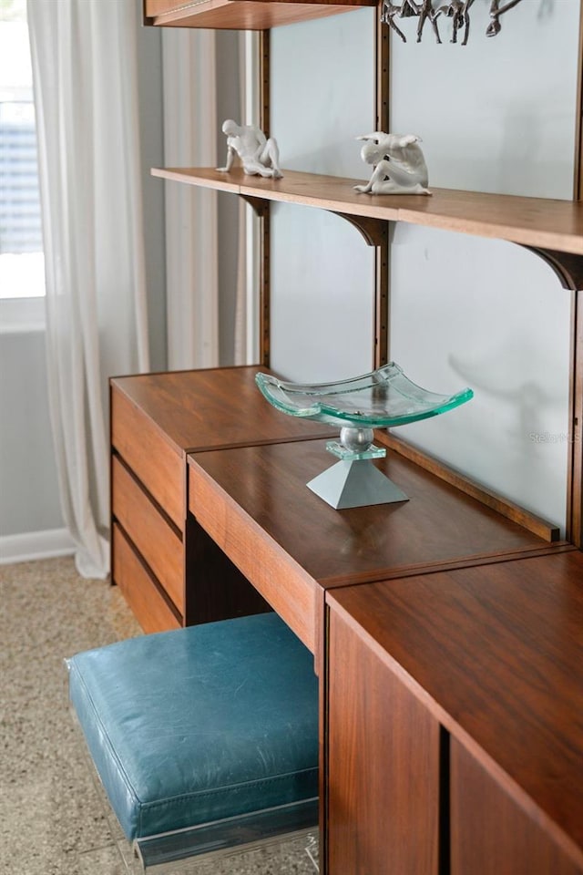 dining area featuring baseboards