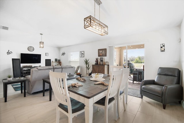 dining area with visible vents and a wealth of natural light