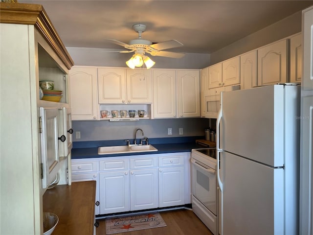 8320 112th St Unit 206, Seminole, FL 33772 - kitchen featuring white cabinets, open shelves, a ceiling fan, a sink, and white appliances