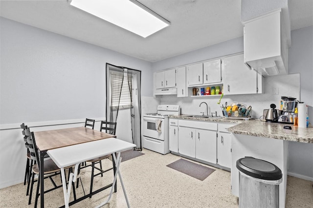 kitchen featuring white electric stove, under cabinet range hood, a sink, and white cabinets