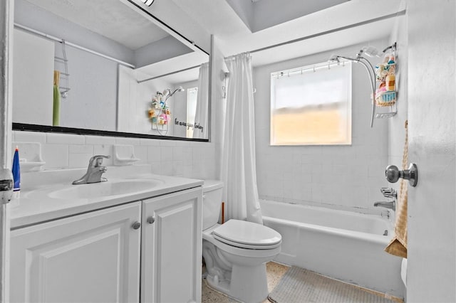 bathroom with vanity, toilet, shower / bath combo, and decorative backsplash