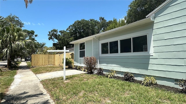 1419 55th St S, Gulfport, FL 33707 - view of side of property featuring crawl space