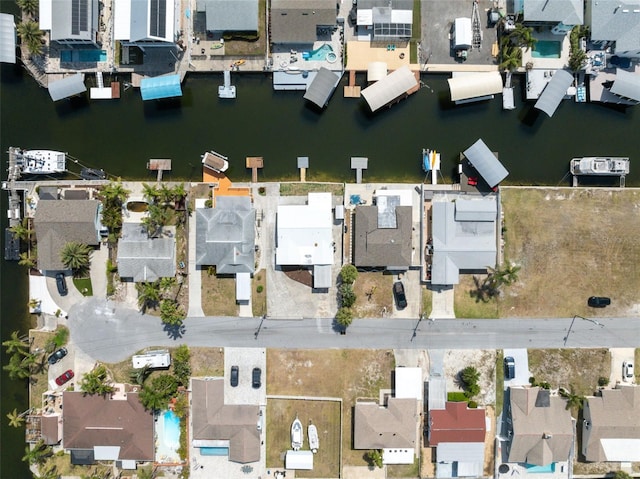 13810 Malcolm Ave, Hudson, FL 34667 - aerial overview of property's location featuring a large body of water and nearby suburban area