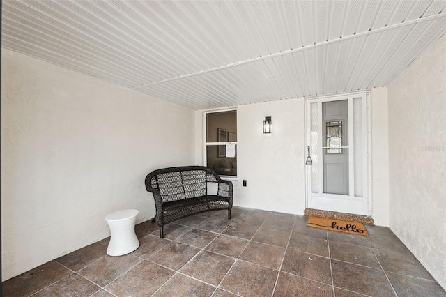 13810 Malcolm Ave, Hudson, FL 34667 - doorway to property with stucco siding