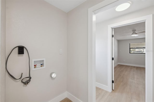13810 Malcolm Ave, Hudson, FL 34667 - washroom featuring hookup for a washing machine, light wood-style flooring, baseboards, and a ceiling fan