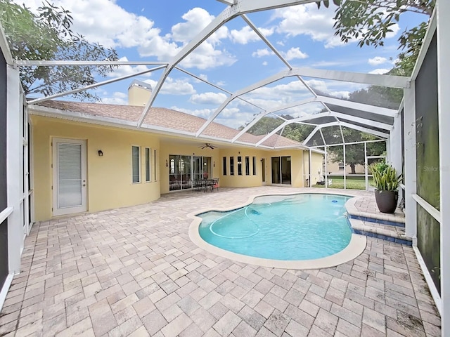 1312 Fishing Lake Dr, Odessa, FL 33556 - pool featuring a patio area, a lanai, and a ceiling fan