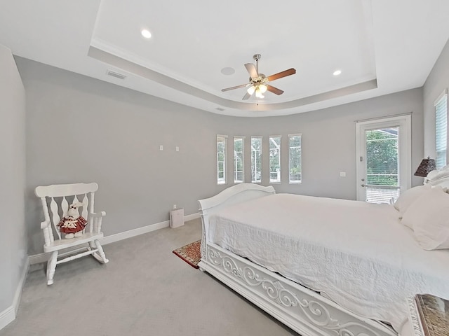 1312 Fishing Lake Dr, Odessa, FL 33556 - bedroom featuring visible vents, carpet flooring, access to outside, and a raised ceiling