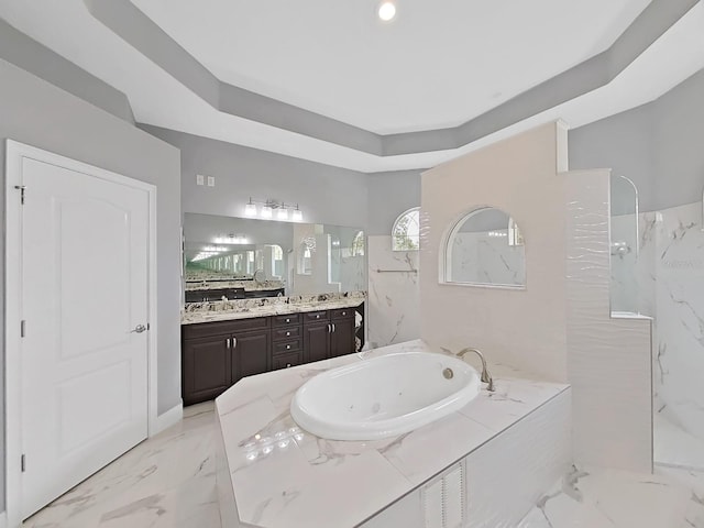 1312 Fishing Lake Dr, Odessa, FL 33556 - bathroom with a marble finish shower, vanity, marble finish floor, a tray ceiling, and a whirlpool tub