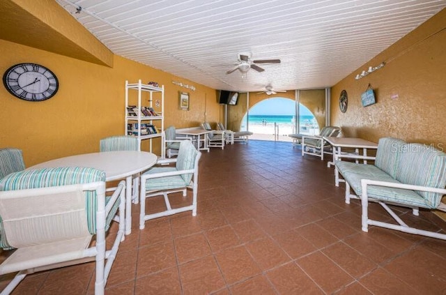 view of patio / terrace featuring a ceiling fan and outdoor dining space