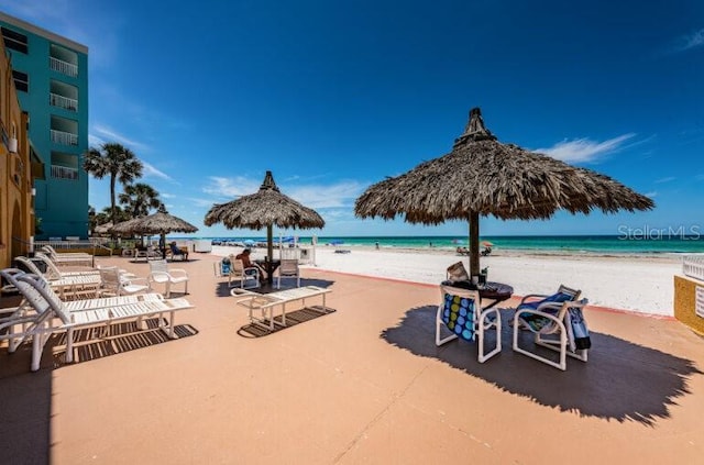 property view of water featuring a gazebo and a view of the beach