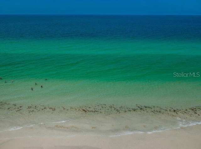 property view of water featuring a beach view