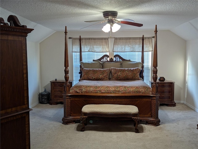 carpeted bedroom with ceiling fan and lofted ceiling