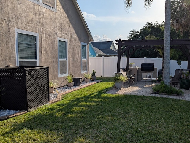 view of yard with a patio, a pergola, and a fenced backyard