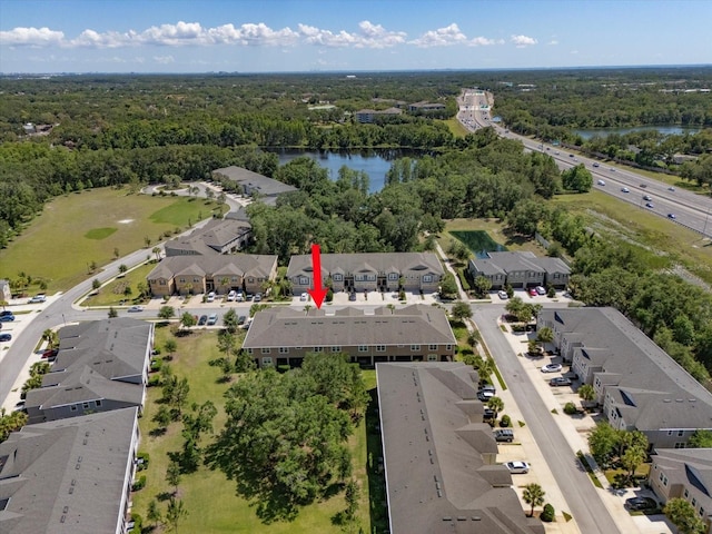 6225 Scarlet Darter Way, Tampa, FL 33625 - aerial view of property's location with a nearby body of water, nearby suburban area, and a heavily wooded area