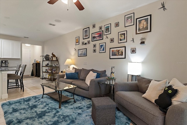 6225 Scarlet Darter Way, Tampa, FL 33625 - living room featuring ceiling fan and light tile patterned floors