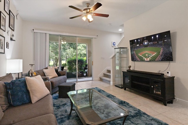 6225 Scarlet Darter Way, Tampa, FL 33625 - tiled living room with stairs, baseboards, and a ceiling fan