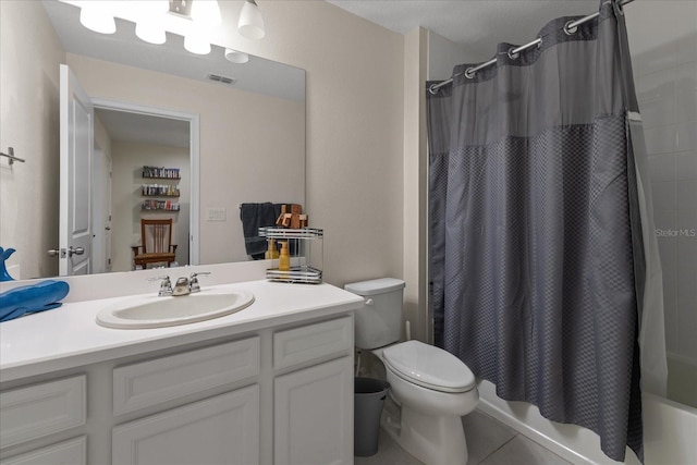 6225 Scarlet Darter Way, Tampa, FL 33625 - full bathroom featuring vanity, toilet, tile patterned flooring, and shower / bath combo with shower curtain