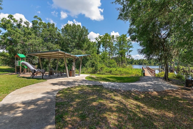 6225 Scarlet Darter Way, Tampa, FL 33625 - view of community with a water view and a yard