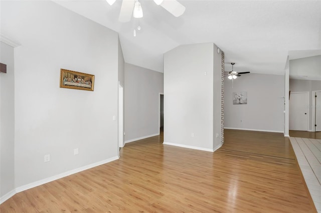 unfurnished living room with lofted ceiling, a ceiling fan, baseboards, and light wood-type flooring
