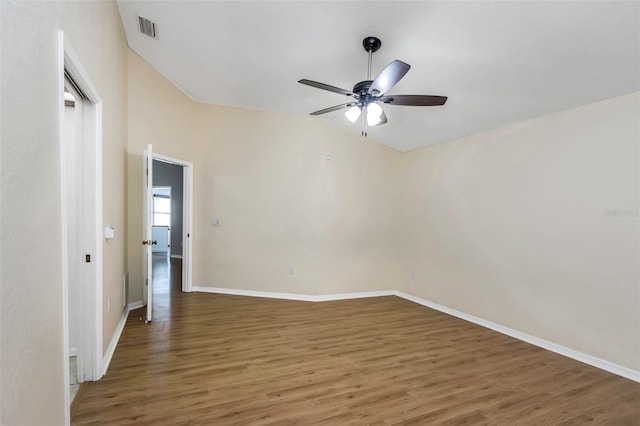 unfurnished room featuring baseboards, a ceiling fan, light wood-style floors, and visible vents