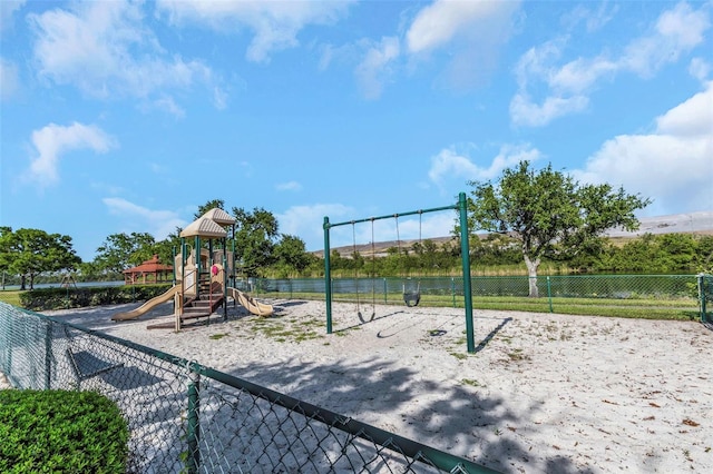 community jungle gym with fence