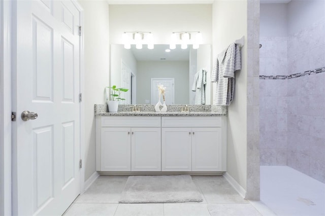 5059 Bromeliad Ave, Wimauma, FL 33598 - full bath featuring tile patterned floors, double vanity, a walk in shower, and baseboards