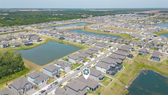 5059 Bromeliad Ave, Wimauma, FL 33598 - aerial overview of property's location featuring nearby suburban area and a large body of water