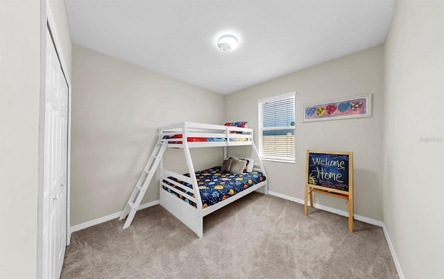 5059 Bromeliad Ave, Wimauma, FL 33598 - bedroom with carpet flooring and baseboards