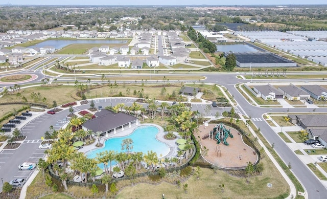 5059 Bromeliad Ave, Wimauma, FL 33598 - view of property location with a pool, a nearby body of water, and nearby suburban area